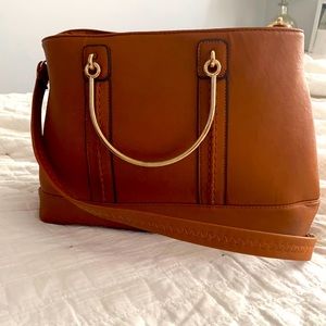 Brown purse with gold handles